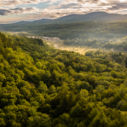 Aerial view of mountains and valleys in Woodbury Mountain Wilderness Preserve.