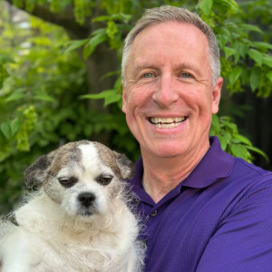Photo of a man and dog